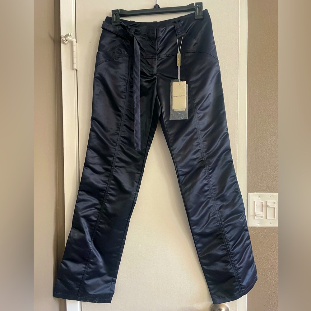 super stylish. size on tag 38 euro. waits measures 27”. inseam 29” 100% nylon.